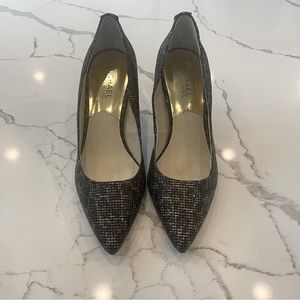Women’s Michael Kors heels size 7. Black and gold leopard.